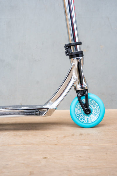 CORE CL1 Complete Stunt  Scooter Chrome & Teal I Adult Stunt Scooter Front Wheel Side