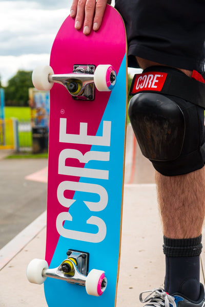 CORE Complete Skateboard C2 Split Pink & Blue 7.75 I Complete Skateboards Holding