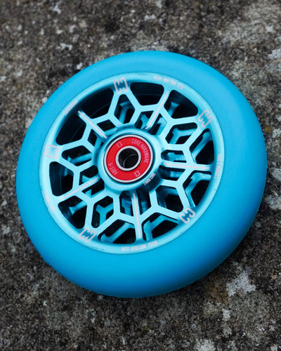 CORE Hex Hollow Stunt Mint Blue Scooter Wheel 110mm I Scooter Wheel Angled Leaning Ground