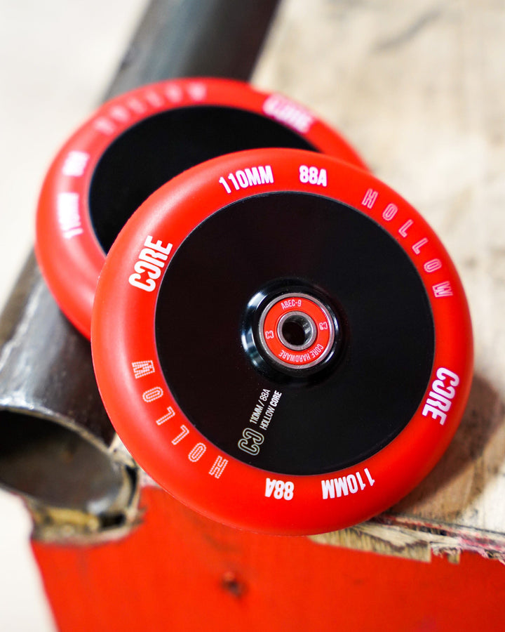 Ruote Scooter Slamm 110mm 88A Nero/Rosso – Coppia Con Giroscopio Cavo Core