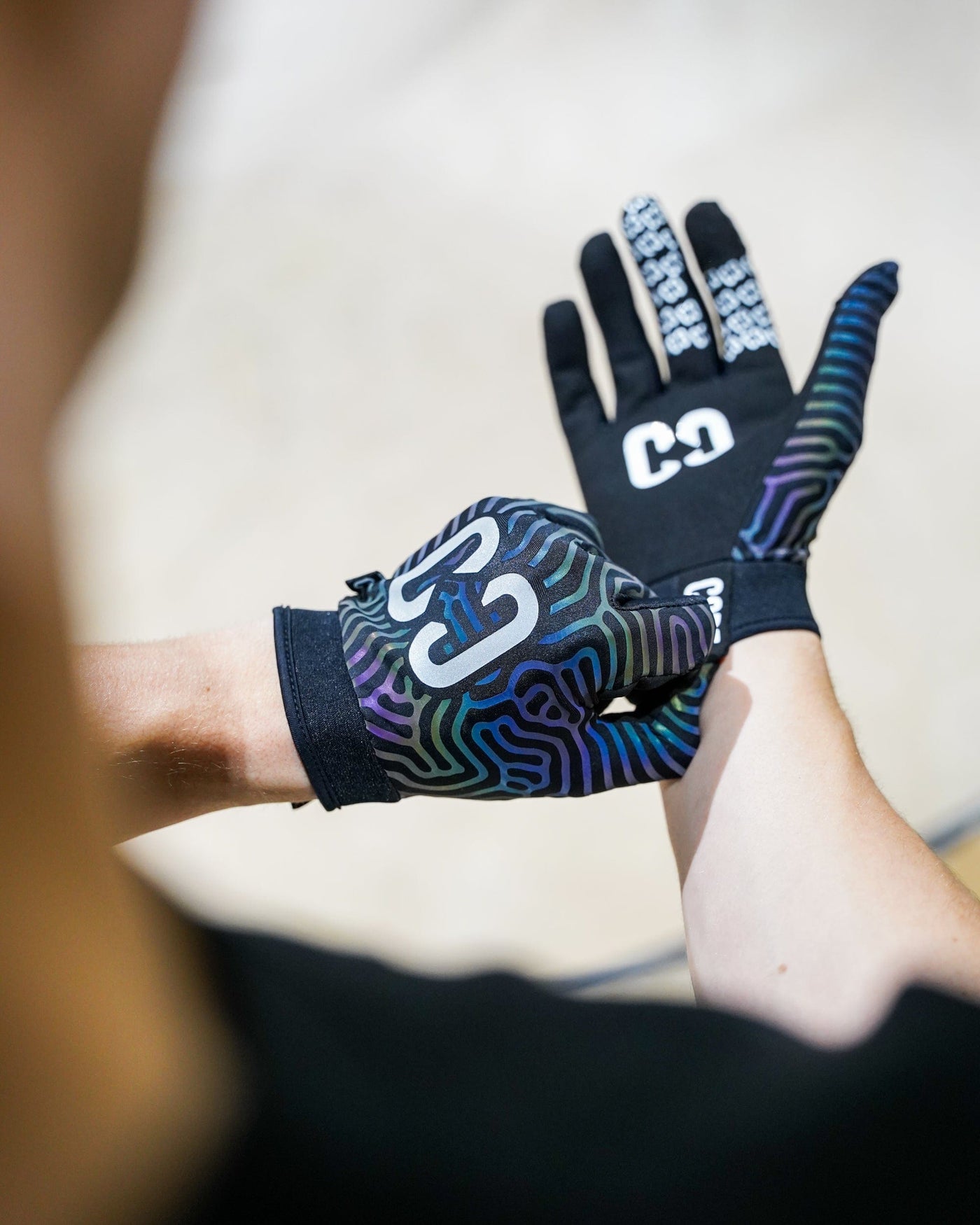 CORE Protection Aero BMX Gloves Neo Chrome I Bike Gloves Putting Product On
