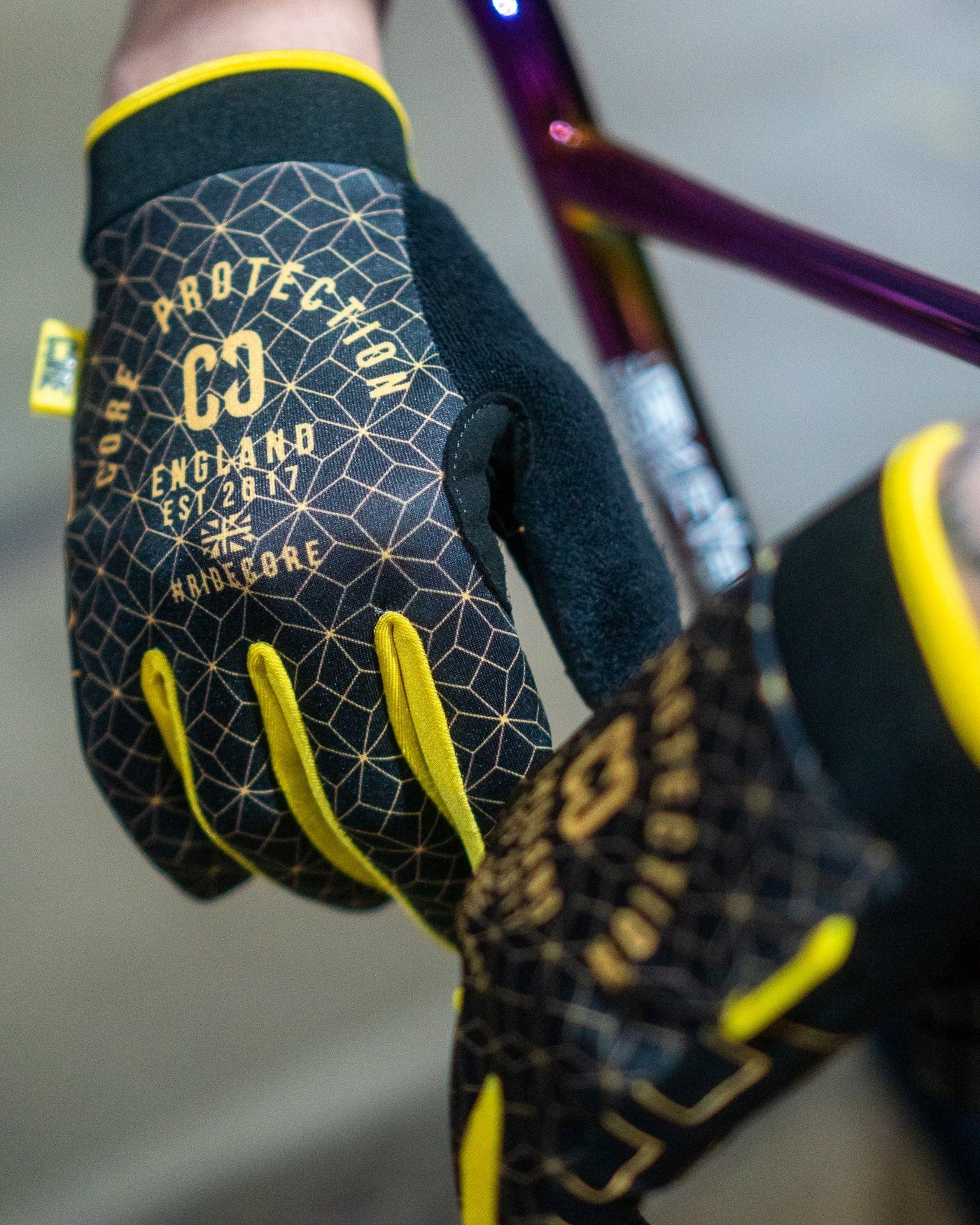 CORE Protection BMX Gloves SR Black Gold Geo I Bike Gloves Alt Zoomed in Logo