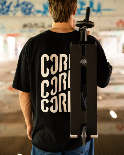 CORE ST2 Stunt Scooter Black I Adult Stunt Scooter Holding